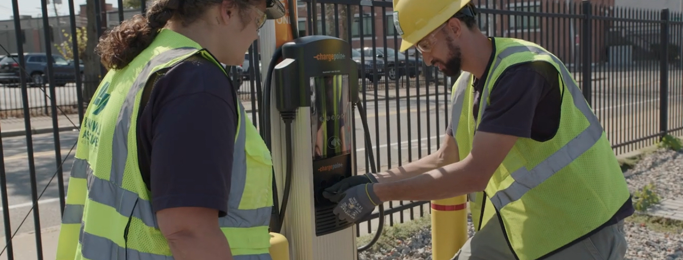 Photo of electricians working on EV charging station